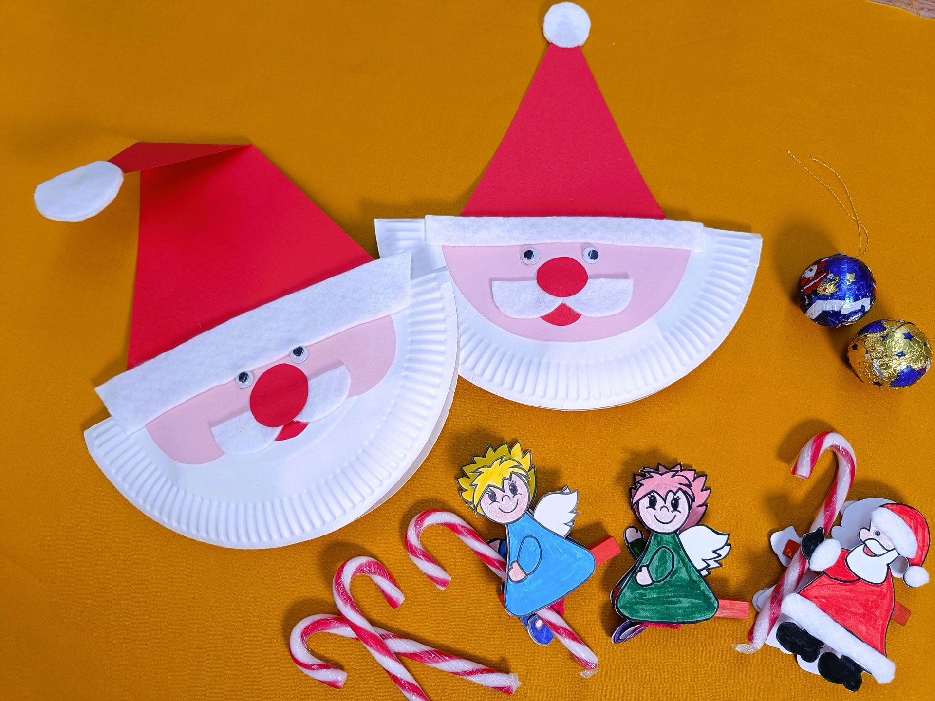 Weihnachtsmann-Gesichter und -Klammerfiguren